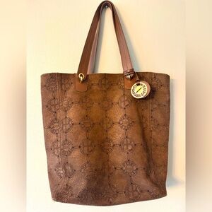 Henri Bendel chocolate bronze Suede
Laser Cut Monogram Shoulder Handbag bag